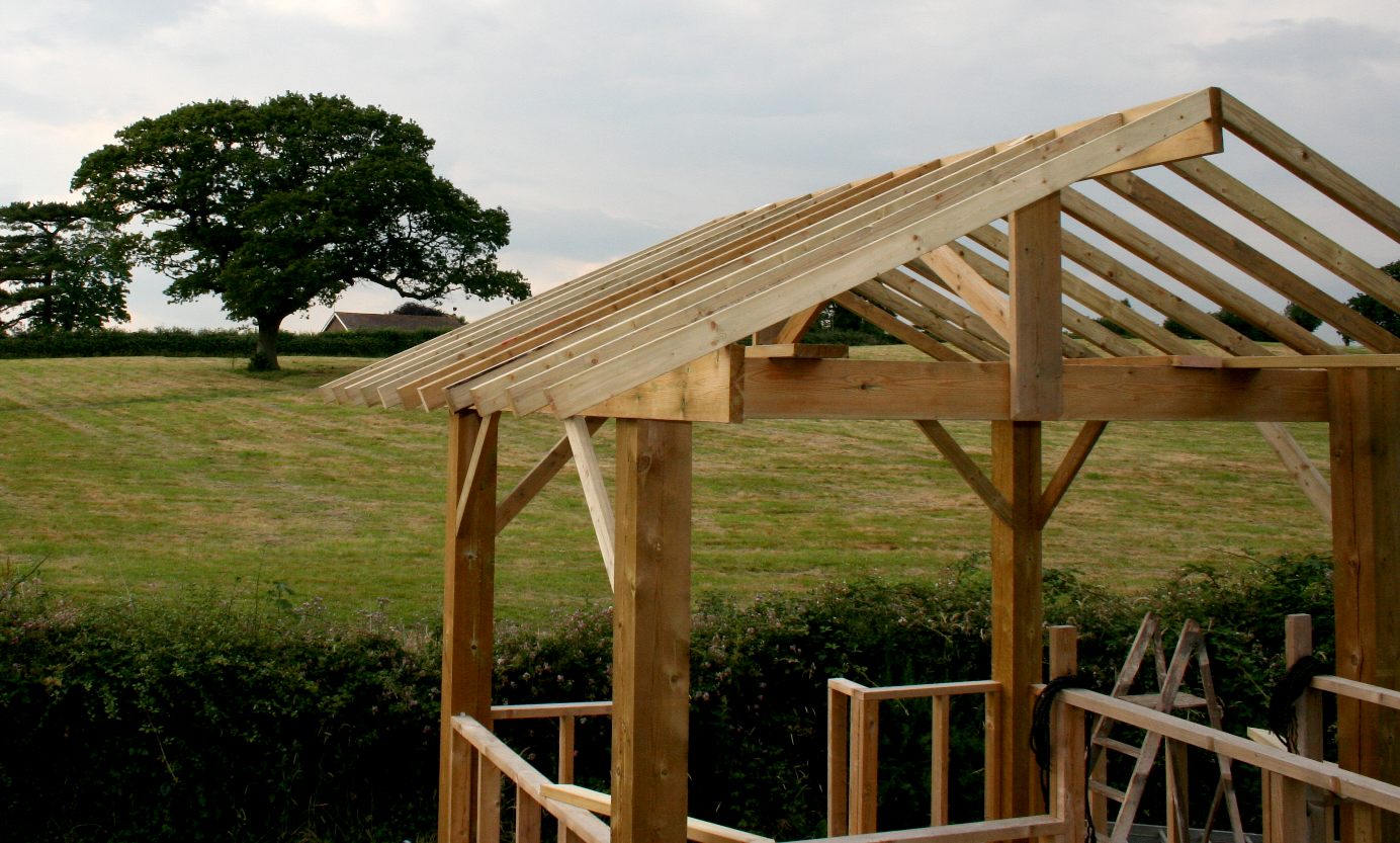 Timber framed pergola as the mounting for a solar panel array