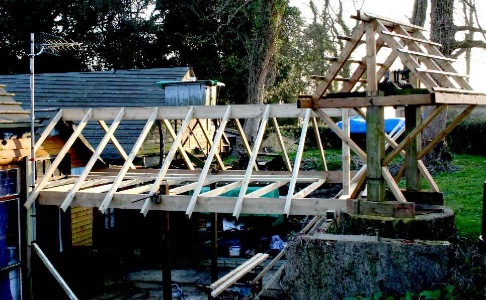 Well, well - and the solar conservatory taking shape behind